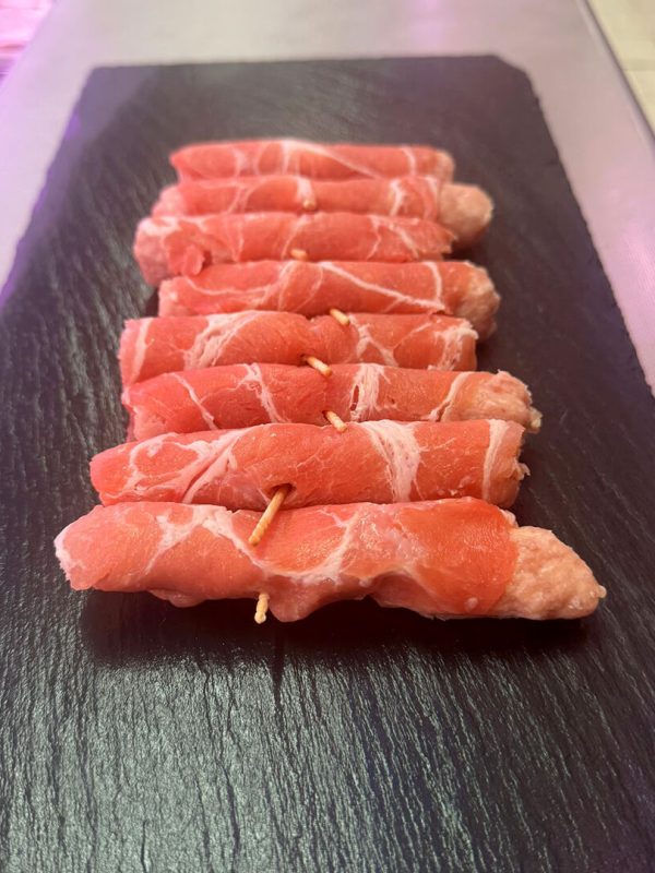 Involtini di carpaccio di suino con carne macinata e parmigiano